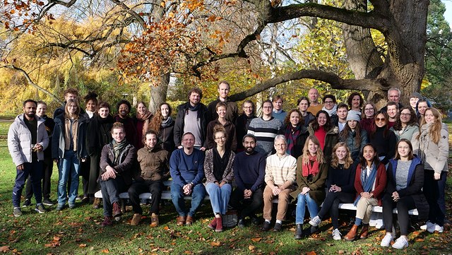 Group photo of the RTG at the retreat in Lüneburg in 2023 in a park under a tree.